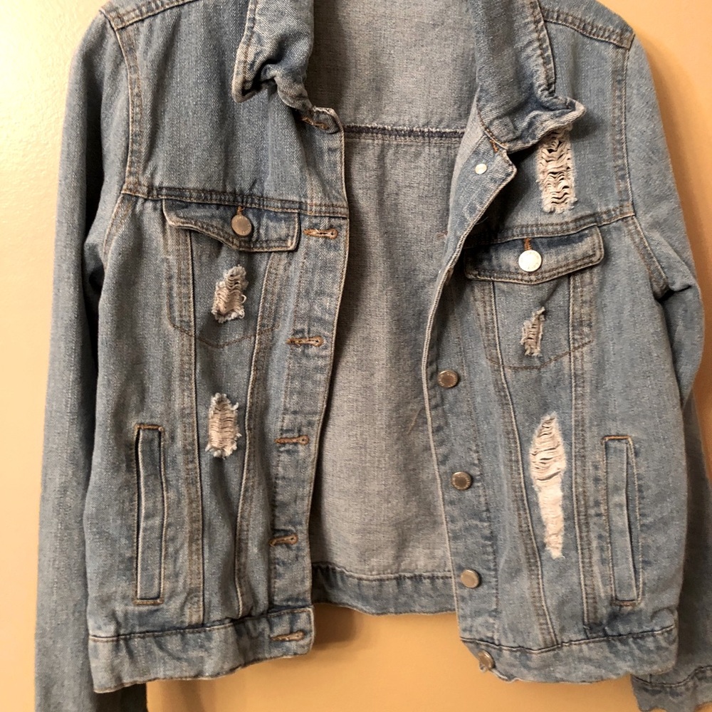 Women’s light colored Denim jacket